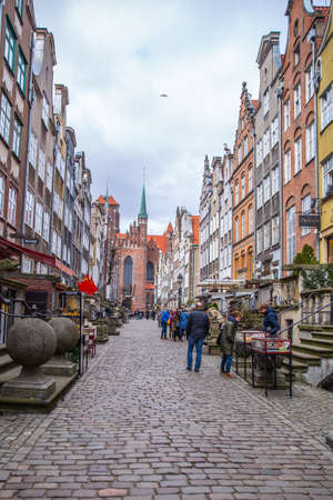 Gdansk, Poland - 12 April 2019; Mariacka street with St. Mary's cathedral in the background