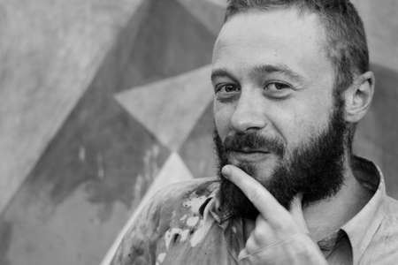 Bearded man thinking or planning black and whiteの写真素材