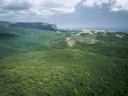 Aerial view mountains and sea in summer, vacation mood, landscapeの写真素材