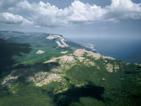 Aerial view mountains and sea from droneの写真素材