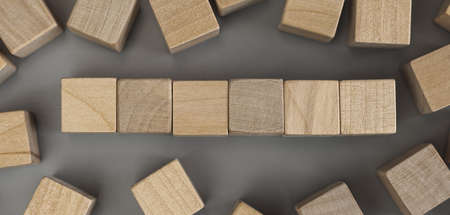 A pile of empty wood block on table. Top view. Business concept for growth success process. Copy space.の写真素材