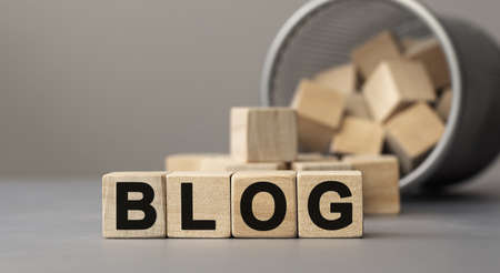 Word BLOG made with cube wooden block on a desk.の写真素材