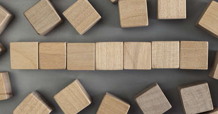 A pile of empty wood block on table. Top view. Business concept for growth success process. Copy space.の写真素材