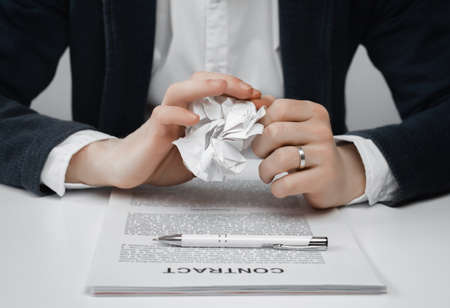 Cropped view of businessman works with financial papers at the table. Finance concept