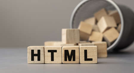 Word HTML made with cube wooden block on a desk.の写真素材