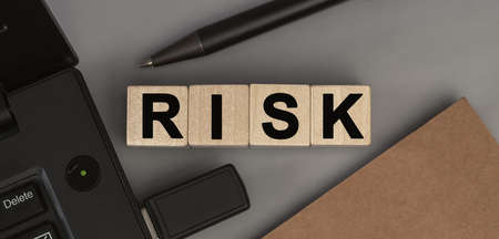 Word RISK made with wood building blocks. Top view, conceptの写真素材