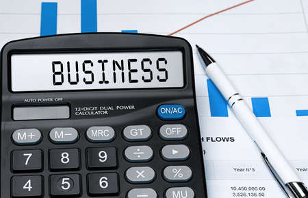 Calculator with the word business on the display. Money, finance and business conceptの写真素材