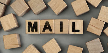 mail - word concept from wooden blocks. Wooden cubes with lettersの写真素材