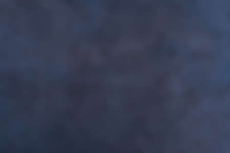 Blurred dark blue background texture. Abstract blur, defocused. Copy space, layout, mockupの写真素材