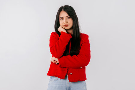 Bored and lazy people. Young brunette woman wearing casual clothes, thinking, looking tired and bored with depression problems, standing over white backgroundの写真素材