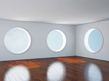 The empty room with big  round windowsの写真素材