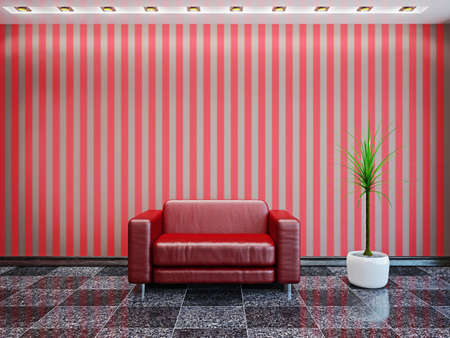 Red leather armchair near the wallの写真素材