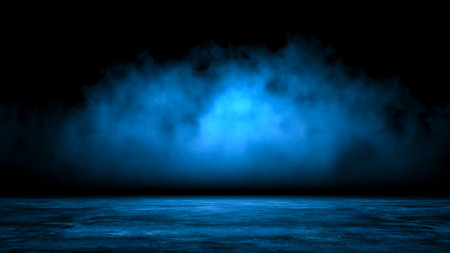 Abstract background with mystic blue smoke over old asphalt. Empty dark city street with horror atmosphere. Night scene with fog without people.の写真素材