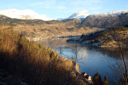 Snow mountain reflecting in Eidfjord Ulvik Norwayの写真素材