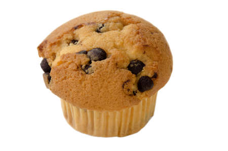 baked muffin with chocolate chips on white backgroundの写真素材