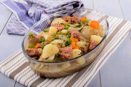 stovies with onions, carrots, potatoes and corned beef, a scottish specialtyの写真素材
