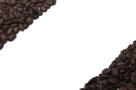 freshly roasted coffee beans and white backgroundの写真素材