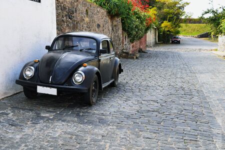 Classic car in a street of Colonia Del Sacramento, Uruguay. Historic and traditional scenic of old town in Uruguay.の写真素材
