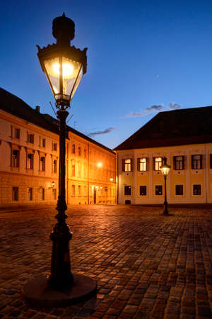 Historic Zagreb Upper Town lanterns at dusk with bright Venus shining in the evening sky.