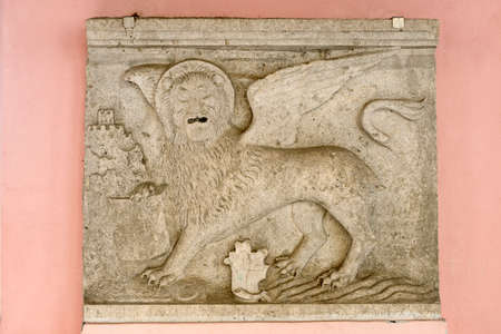 Stone bas-relief of a venetian winged lion from the croatian town of Oprtalj (Portole) in Istria.の写真素材