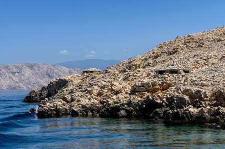 Abandoned bunkers on St. Grgur, a small croatian island with harsh, but beautiful cliffs. It was a home to women's political prison during Yugoslavia.の写真素材