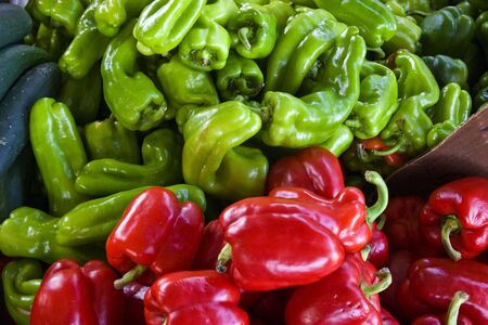 Bin of red & green hot peppers at a local farmers market.の写真素材