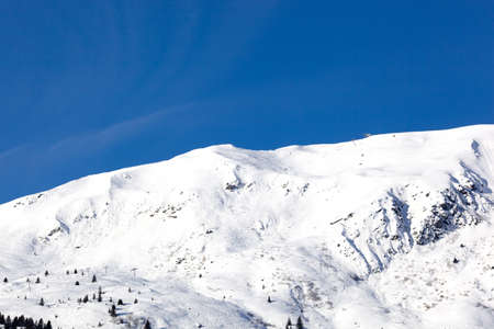 Panoramic view of the mountains of France on a winter sunny day. Haute Savoy, France. Snow park.