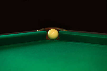 Playing billiard. Billiards balls and cue on green billiards table. Billiard sport concept. Pool...