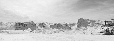 A beautiful winter landscape of snow-covered forest. Haute Savoy, France. Snow Park. Monochrome Photo.の写真素材