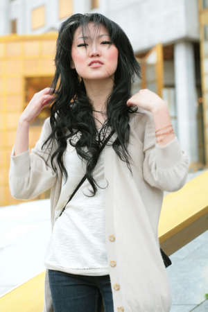 asiatic beautiful model on windの写真素材