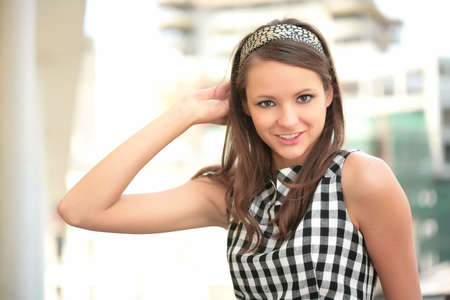 portrait of the young girl correcting hairsの写真素材