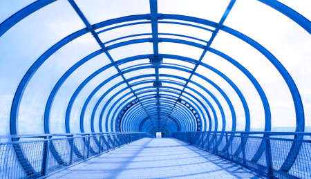 glass corridor of the street pedestrian crossingの写真素材