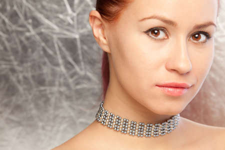 closeup portrait of the beautiful woman with chokerの写真素材