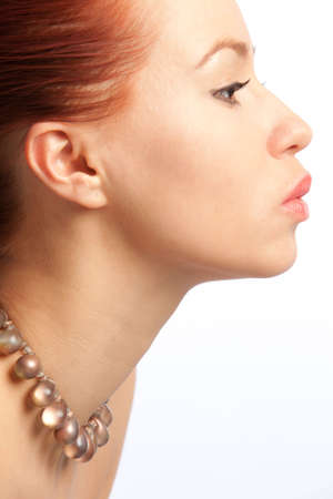 portrait of the beautiful girl with necklaceの写真素材