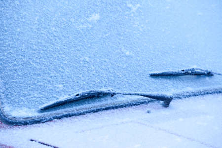 fragment of the car under blue snow, can be used as backgroundの写真素材
