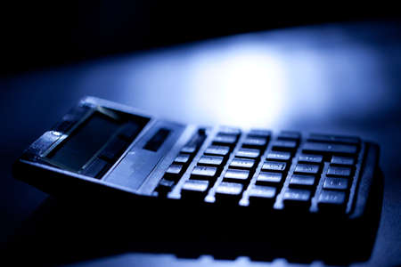 calculator, close-up with copy-space. small depth sharpness