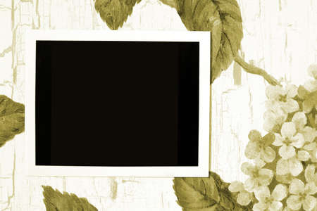 aged photo frame on old paper with painting
