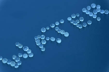 water on a blue background from balls, close-up