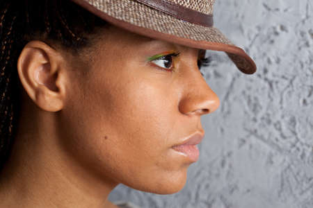 profile portrait of a black girl in hatの写真素材