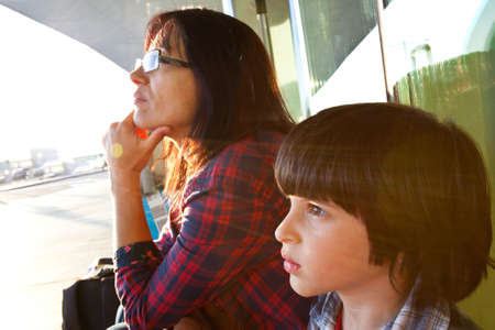 mother and son watchingの写真素材