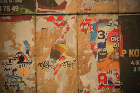 surface of the billboard with scrap of the paper announcements and postersのeditorial素材