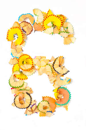 Photo of figure 6 from colored shavings on white backgroundの写真素材