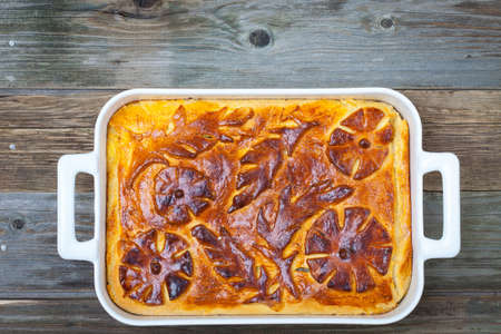 shred-pie in a white ceramic pot on vintage table