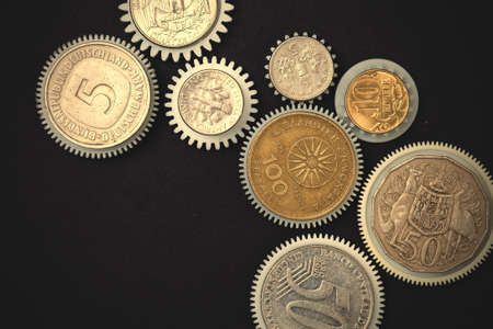 Coins gears on a black background. business concept. instagram image filter retro styleの写真素材