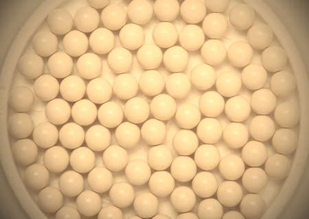white balls in a circle. background, close-up.  image filter retro styleの写真素材