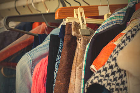 clothes on hangers in the wardrobe.  image filter retro style