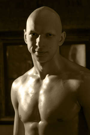 close-up portrait of a smiling fighter unkindlyの写真素材