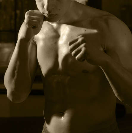 body boxer in fighting stance. retro style effectの写真素材