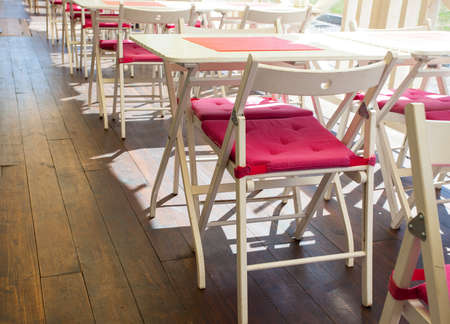 empty summer outdoor cafe at morningの写真素材