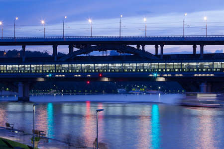 summer night landscape with Luzhnetsky metro bridge in Moscow, Russiaの写真素材